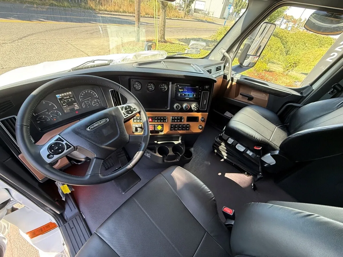 Cab interior with leather seats and dashboard