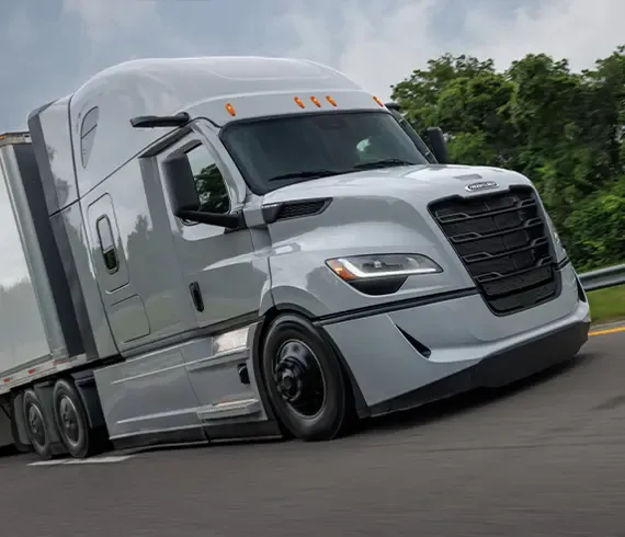 Sleeper tractor pulling a trailer on the highway